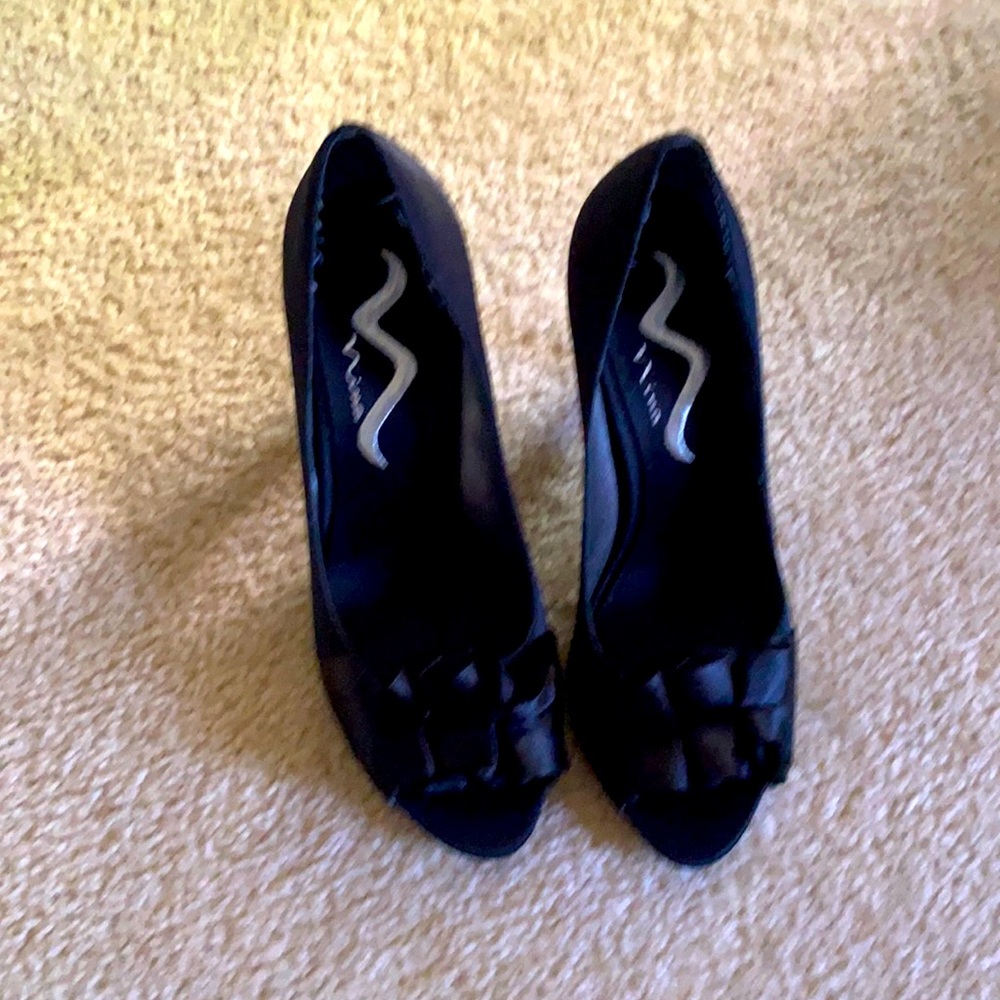 Black satin open toe pumps